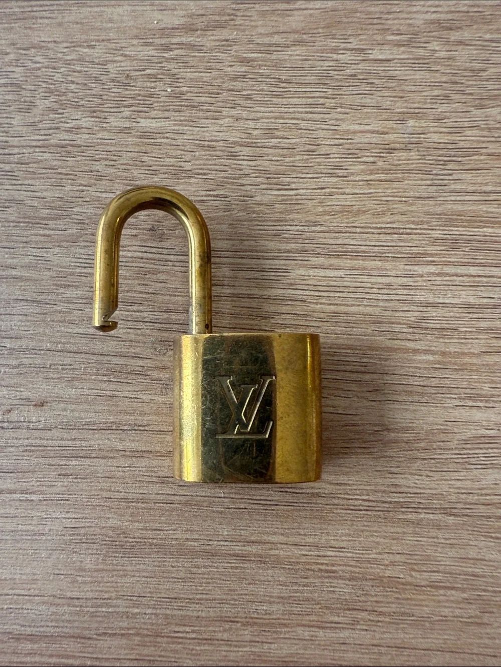 Louis Vuitton compact gold